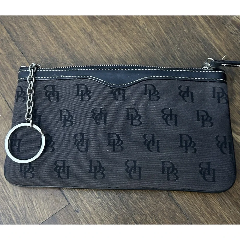 Dooney & Bourke black monogram zip pouch with a key ring attachment
